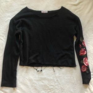 black w roses on one sleeve